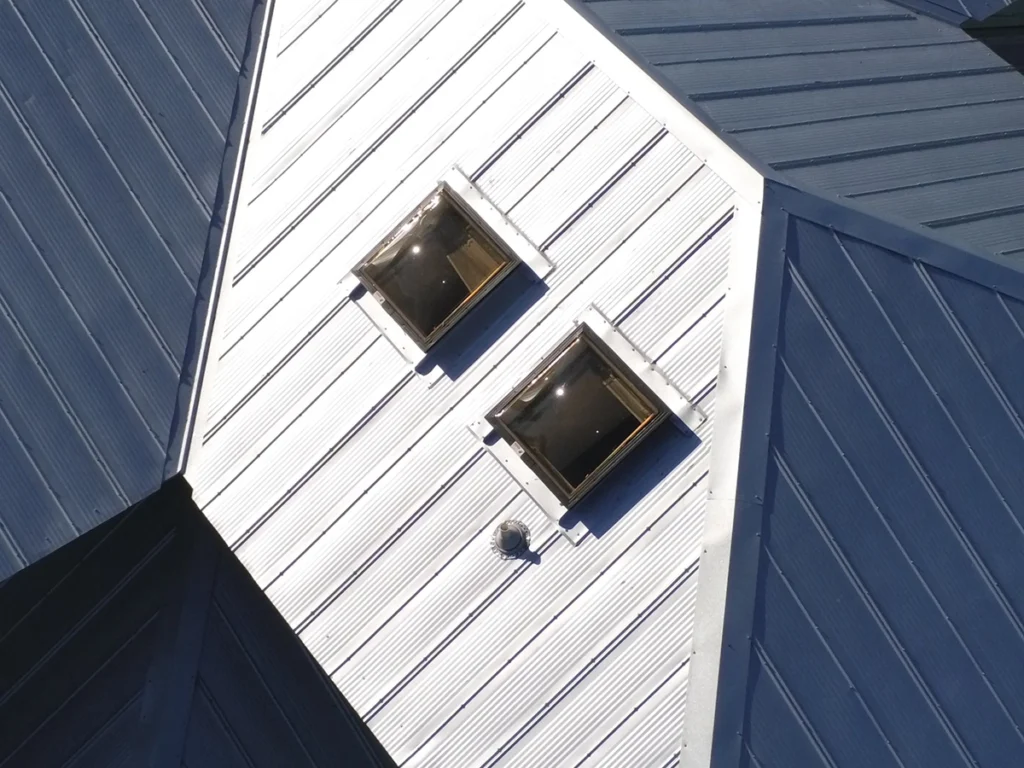Overhead image of a standing seam metal roof installed by Top Hat Roofing